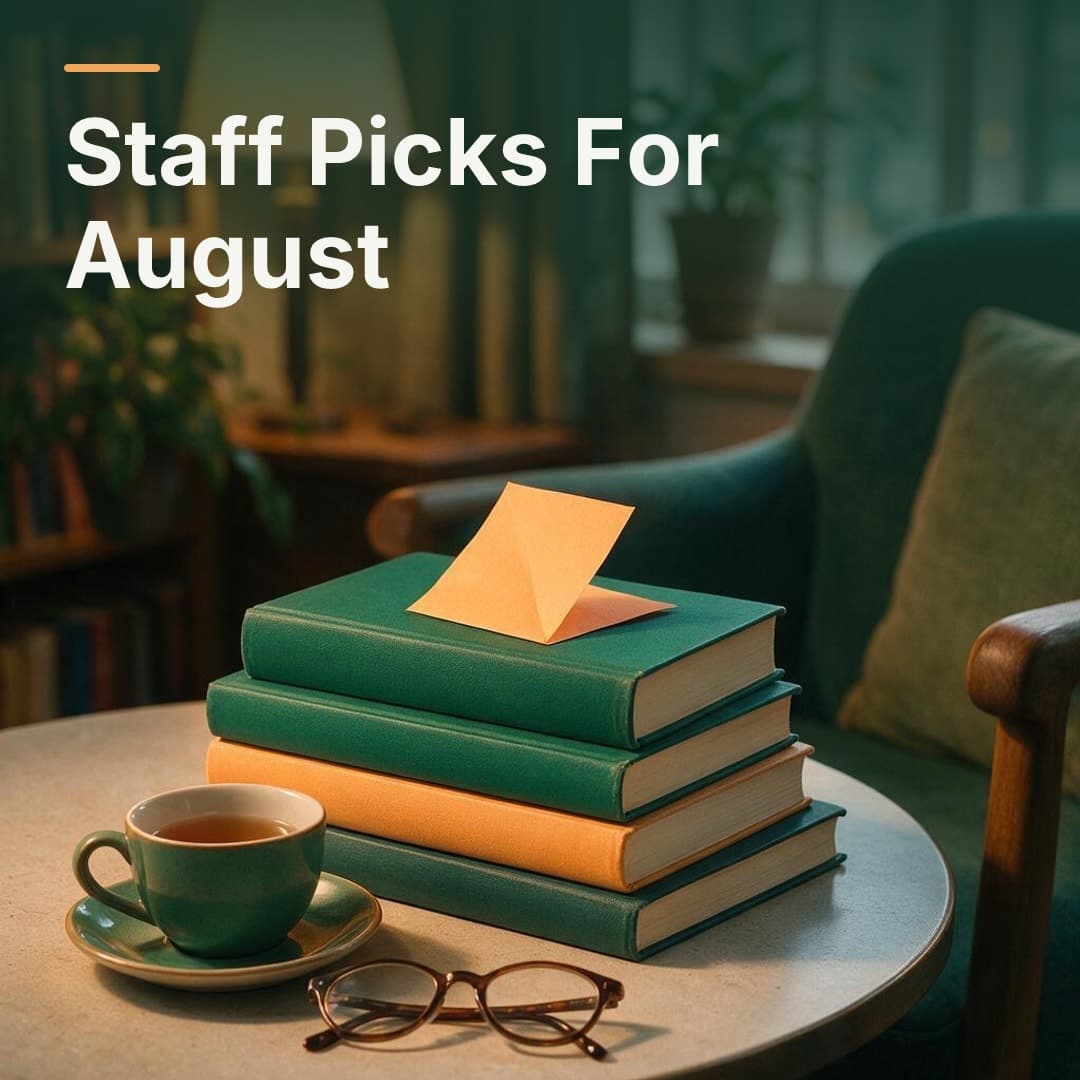 A stack of hardbacks and a cup of tea