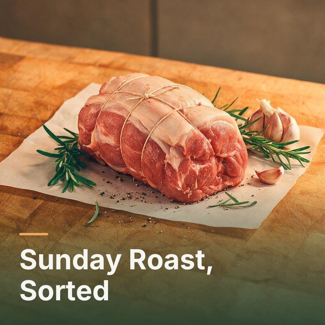 A tied joint of meat with rosemary and garlic