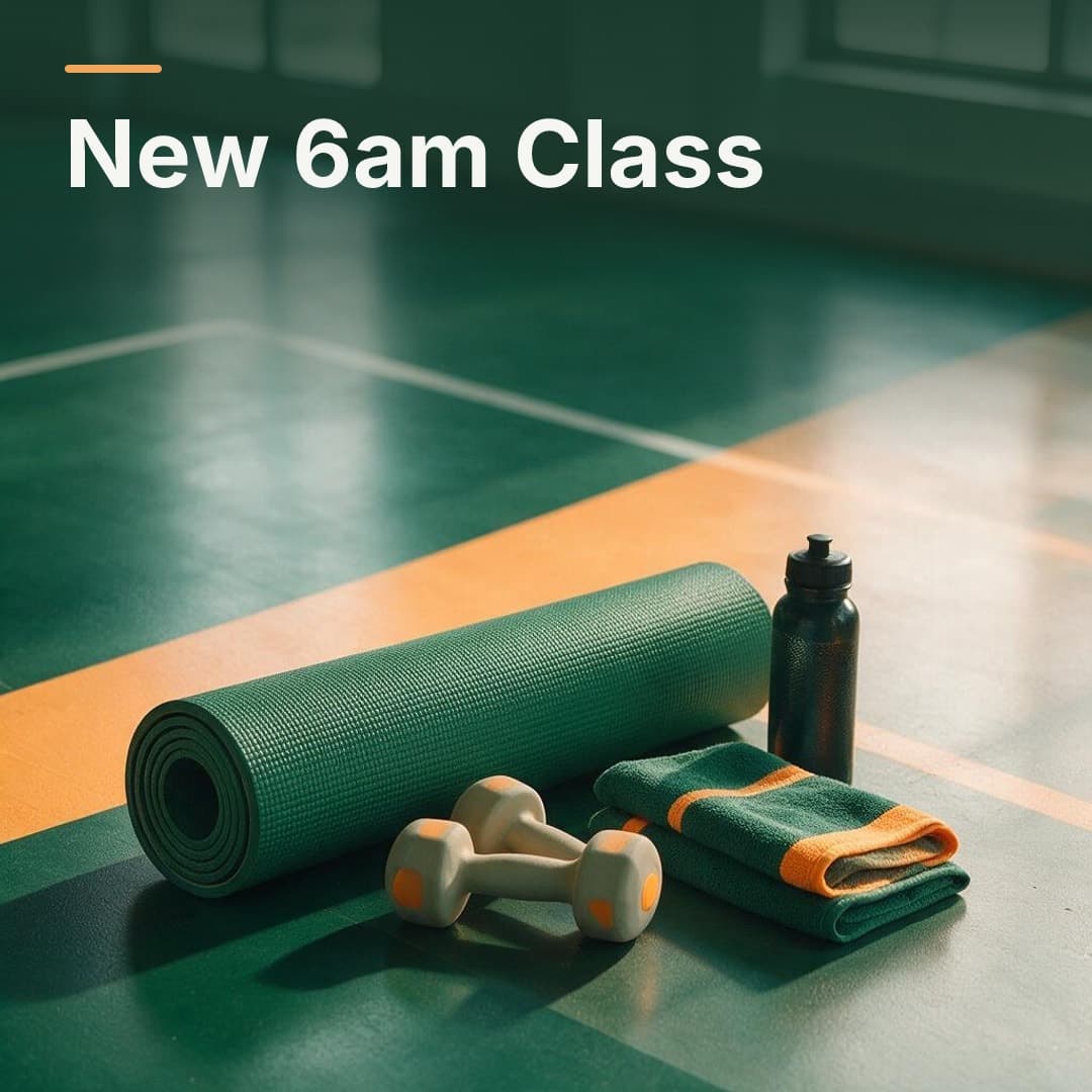 A rolled mat, bottle and towel set out